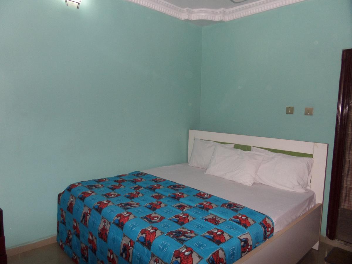 De-Zone Hotel Ikotun Bagian luar foto