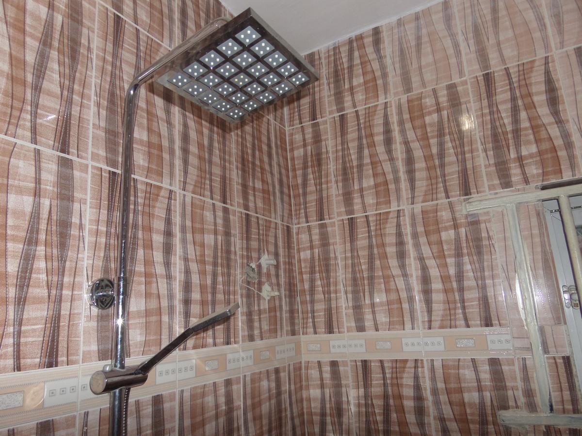 De-Zone Hotel Ikotun Bagian luar foto