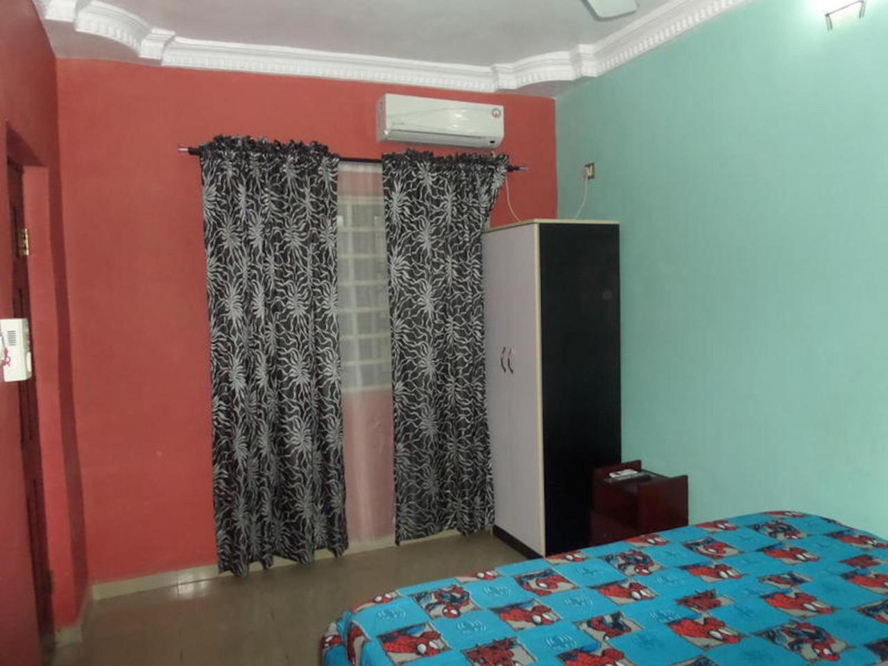 De-Zone Hotel Ikotun Bagian luar foto